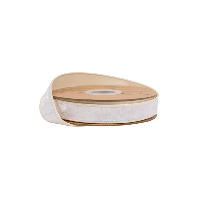 1" wired heritage velvet ribbon in soft ivory, ideal for elegant gift wrapping and timeless decor accents.