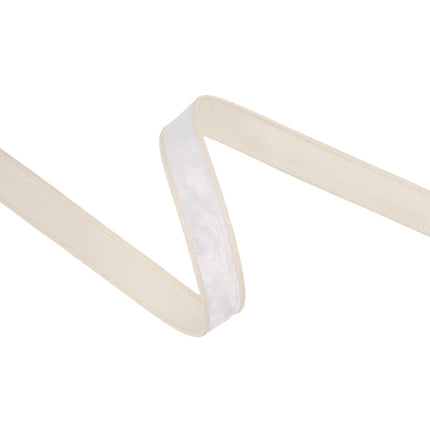 1" ivory heritage velvet ribbon with sturdy wired trim, great for adding soft texture to gifts and decor.