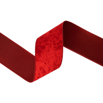 Luxurious red wired velvet ribbon, 4" wide, offering a rich velvety finish for bold seasonal projects.