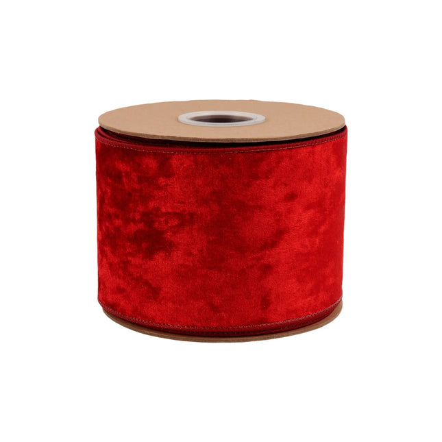 Premium red velvet wired ribbon, 4-inch width, with plush texture for oversized statement bows