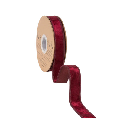 Luxurious burgundy wired velvet ribbon, 1" wide, offering a deep, sophisticated finish for any project.