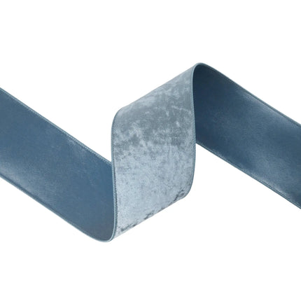 Luxurious French blue wired velvet ribbon, 4" wide, offering a muted, velvety finish for sophisticated projects.