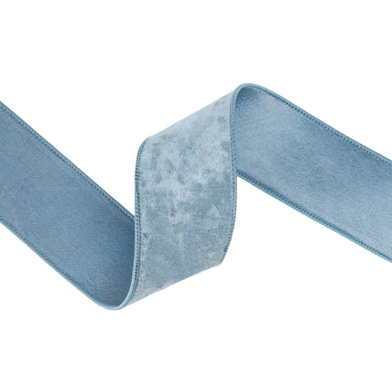 Luxurious French blue wired velvet ribbon, 2.5" wide, offering a muted, velvety finish for any project.