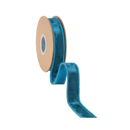 Luxurious teal wired velvet ribbon, 1" wide, offering a plush, deep hue for seasonal and everyday projects.