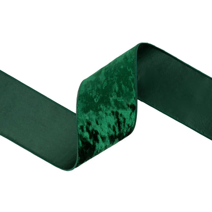 Luxurious hunter green wired velvet ribbon, offering a deep velvety finish for eye-catching seasonal projects.
