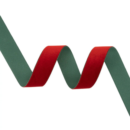 1-inch red/green two-sided velvet ribbon with smooth texture, great for wreaths and party decorations.