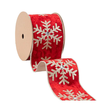 A spool of 4" wired velvet ribbon, red with glitter gold snowflakes and jewels, featuring a curled section to show its detailed design and wired structure.