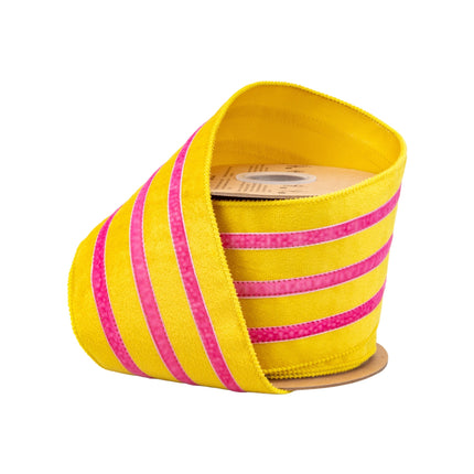 4" wired yellow velvet ribbon with pink trim, partially unspooled for gift wrapping.