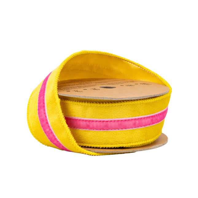 1.5" wired yellow velvet ribbon with pink trim, partially unspooled for gift wrapping.
