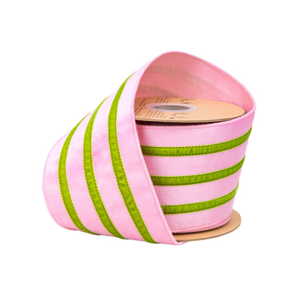 4" wired pink velvet ribbon with green trim, partially unspooled for gift wrapping.