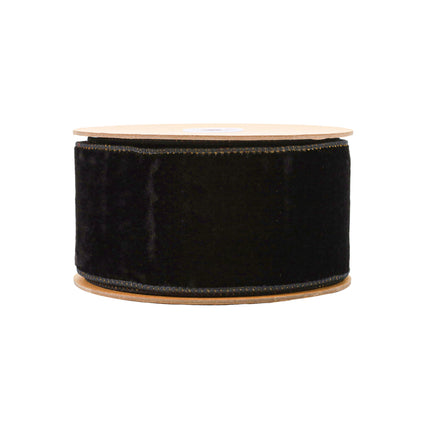 Black velvet ribbon (gold-lined) spool, perfect for making decorative bows for formal party favors.
