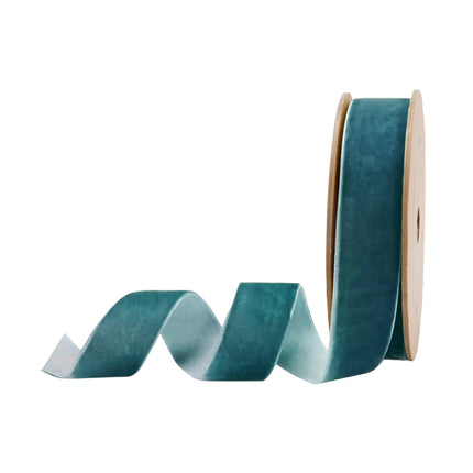 1" Peacock velvet ribbon on a brown spool, perfect for crafting elegant bows for wedding centerpieces.