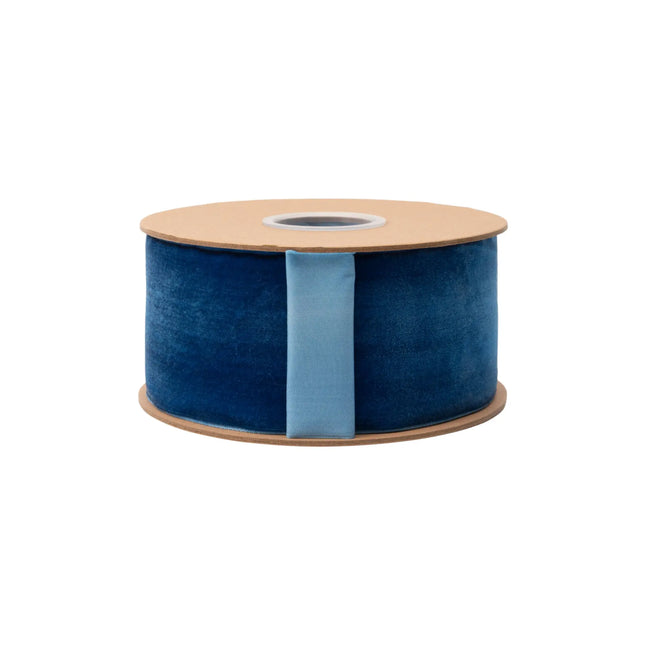 Vibrant royal blue unwired velvet ribbon, 2.5-inch width, smooth fuzzy texture for wedding and floral crafts