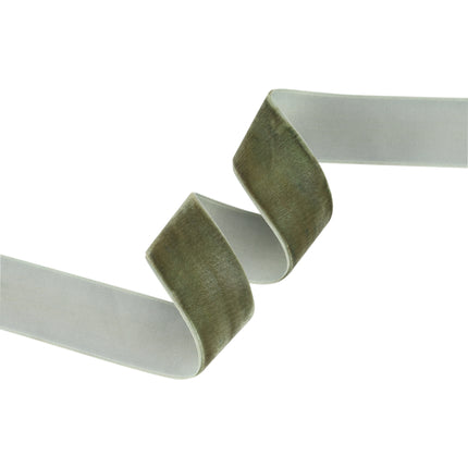 A strip of olive green velvet ribbon, suitable for DIY home decor trims, blending luxury with versatile seasonal use.