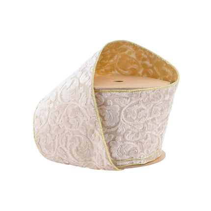 Roll of ivory floral embossed velvet ribbon, reversible to gold, with gold-edged detail. Luxe texture.