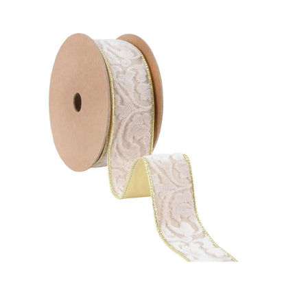 A spool of 1 1/2" wired velvet ribbon, ivory floral-embossed with gold backing, with a curled section showcasing its refined design and texture.