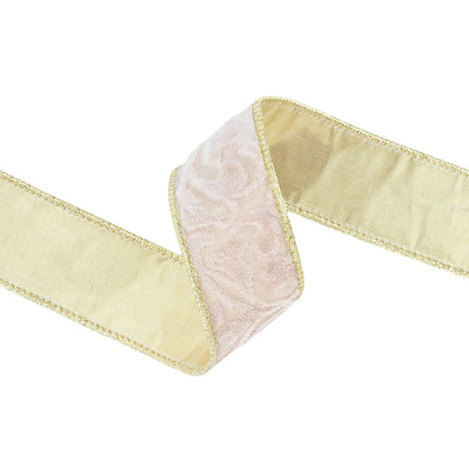  A curled piece of 1 1/2" wired velvet ribbon, ivory floral embossed with gold backing and trim, vividly displaying both front and back details.