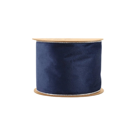 This reversible velvet wired ribbon is navy with a silver backing, perfect for creating elegant accents in event decor.