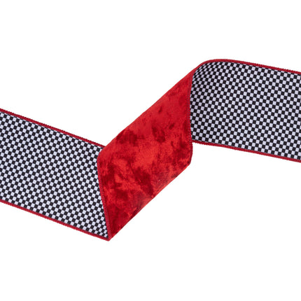 A strip of wired velvet ribbon, red on one side and black-and-white check on the other, great for adding texture and contrast to projects.