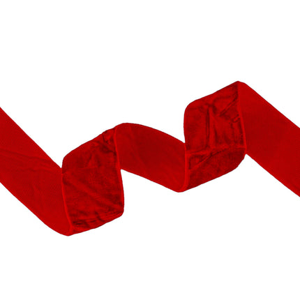 Rich 1" crushed velvet ribbon in a deep red hue ribbon, suitable for festive decor, crafting, and gift presentation.