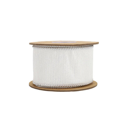 A roll of white ribbon exhibits a rich, textured finish with a slight sheen and precise edge stitching, great for holiday crafts.