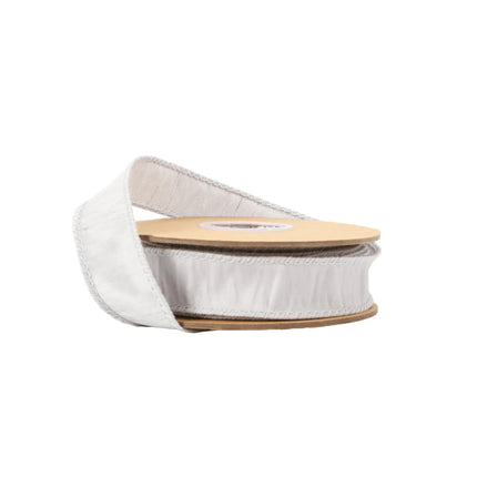 A spool of white textured ribbon with subtle stitching, great for holiday styling, gift adornment.