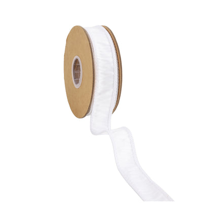 White Valentine ribbon spool (side): ruffled, stitched edge, unrolled end