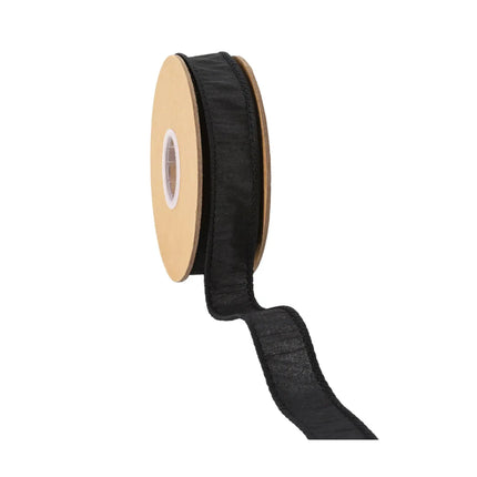 Black ribbon spool with textured fabric, side view, solid black color, detailed stitching.