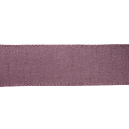 A piece of purple ribbon showcases a muted, elegant hue and a gently wrinkled texture, with precise edge stitching.