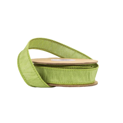 A spool of light green ribbon features a textured surface with neat, ideal for adding a fresh touch to crafting.