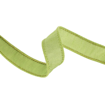 This light green ribbon is characterized by its soft, textured appearance, soothing light green tone, perfect for festive decor.