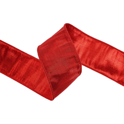 A red ribbon with a classic, solid color and a sleek, shiny texture, partially unfurled to highlight its elegant appearance.