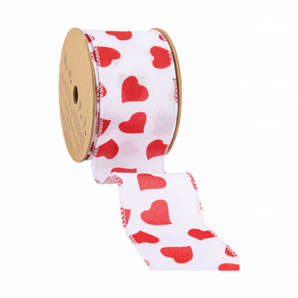 White wired ribbon roll: Bold red hearts, red stitched edges, partial unroll.