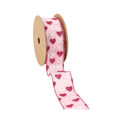 Pink wired ribbon spool (unrolled): red glitter hearts, white XO designs.
