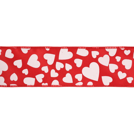 Close-up red wired ribbon; multi-size white hearts, neat stitched edges.