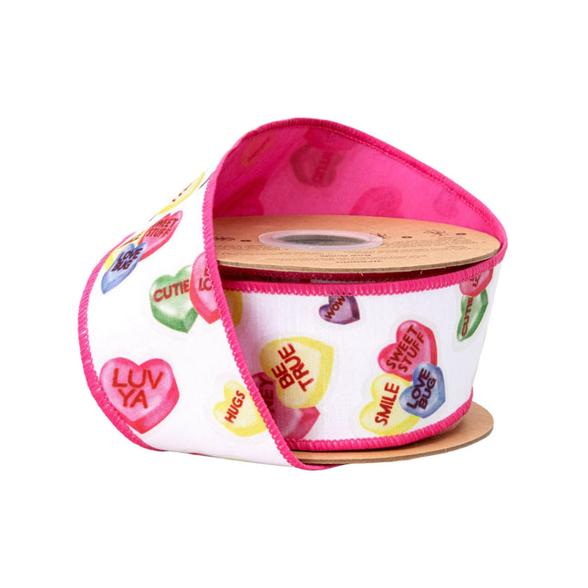 Wired ribbon: Colorful heart motifs (with "HUGS," "LOVE BUG") + bright pink backing — ideal for Valentine’s gifts.