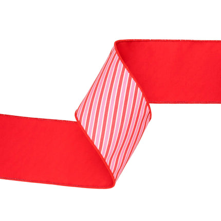 4" wired dupioni ribbon, it boasts Red/White Varied Diagonal Stripe prints and a coordinating red backing, elevating the energy of gift bows
