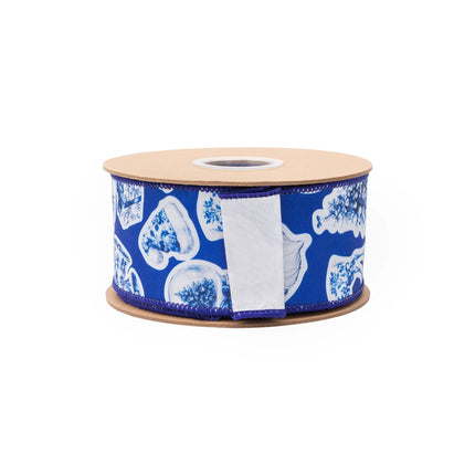 2 1/2" Christmas icon wired dupioni ribbon, blue base with festive white designs and matching white backing
