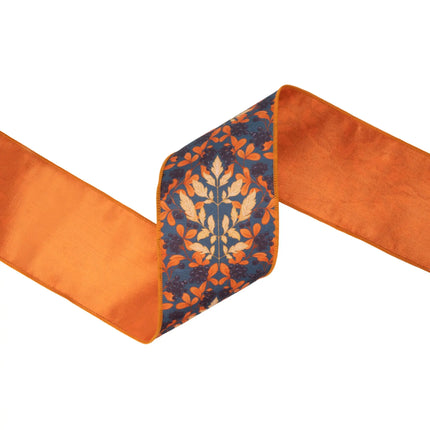 wired dupioni ribbon with orange cream flame‑leaf print, rich navy tone and shiny orange satin backing for wreath crafts