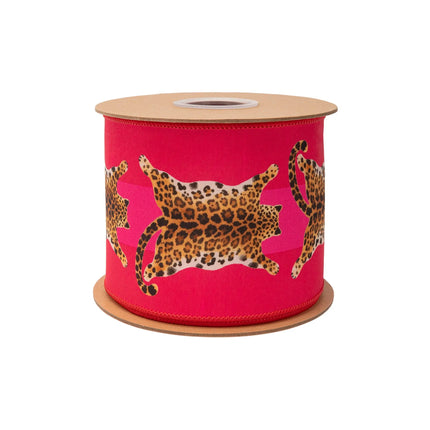 Hot pink wired ribbon with realistic leopard silhouette pattern, with matching pink reverse side