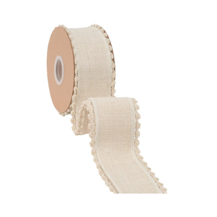 2 1/2" double-sided fringe trim ribbon on ivory canvas, great for gift wrapping.