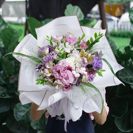 Lush mixed floral bouquet featuring peonies, lisianthus, and filler flowers, wrapped in 58x58cm White Matte Floral Sheets with Gold Edge