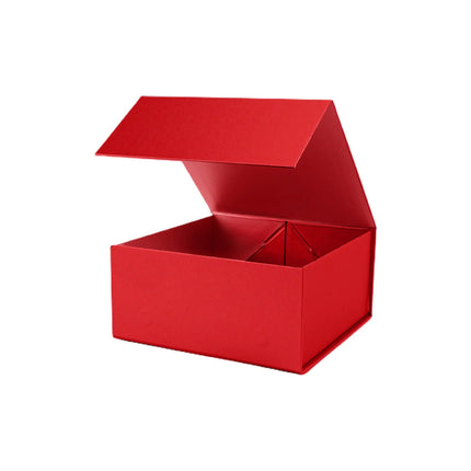 A red gift box with a partially open, angled lid, featuring a smooth, solid design, suitable for Christmas gifting.