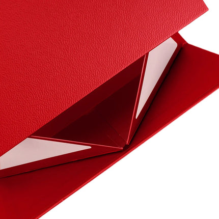 A red gift box with a textured surface, showing assembly with adhesive tabs, easy to set up.