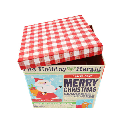 Collapsable gift box with removable lid in a holiday newspaper design, featuring festive characters like Santa and a snowman.