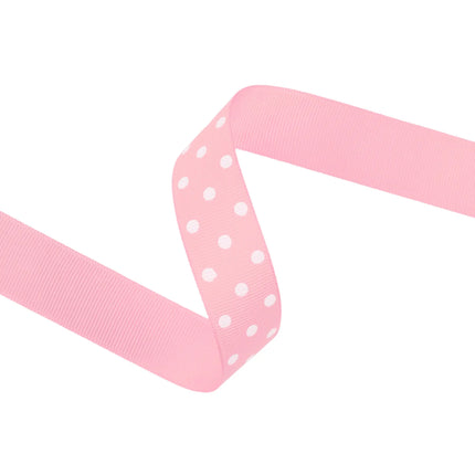 Pastel pink grosgrain ribbon with white polka dots, durable woven texture for DIY bows and scrapbooking