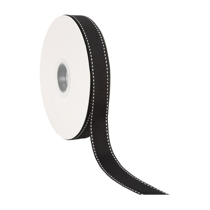 Black grosgrain ribbon with white saddle stitch on spool, partially unrolled