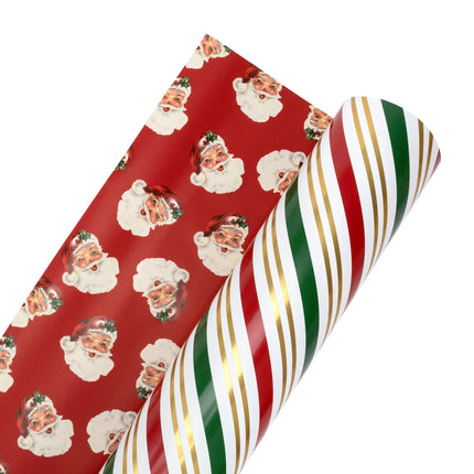 Bulk metallic holiday wrapping paper, 24" x 417' half ream, double-sided with holiday stripe and vintage Santa faces patterns.