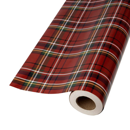Two-sided holiday wrapping paper combining timeless tartan plaid and charming decorated tree prints