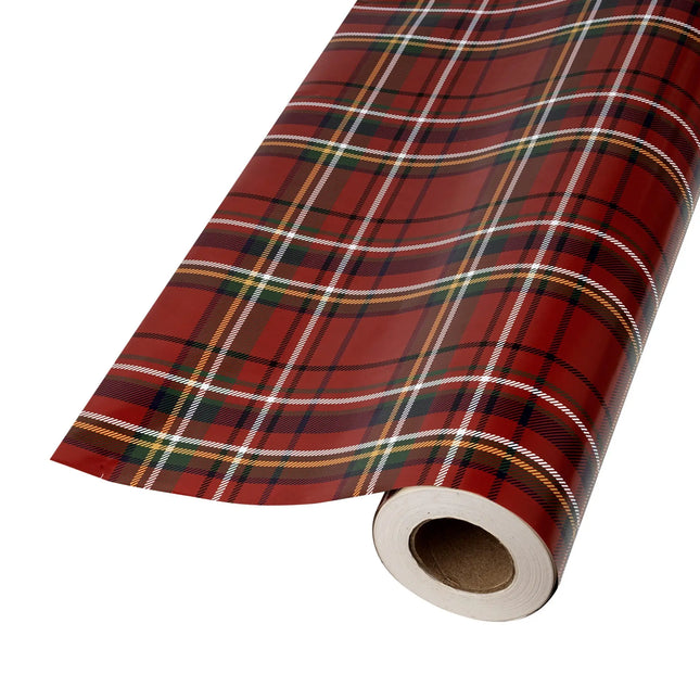 Two-sided holiday wrapping paper combining timeless tartan plaid and charming decorated tree prints